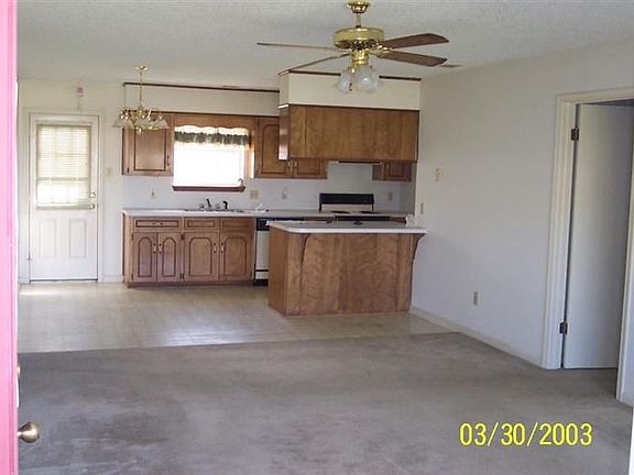 Living Room Opens to Kitchen