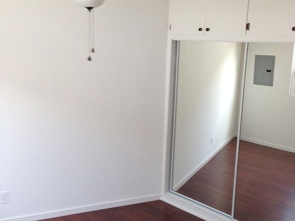 2 Bedrooms, hardwood floors, mirror closet doors, ceiling fans