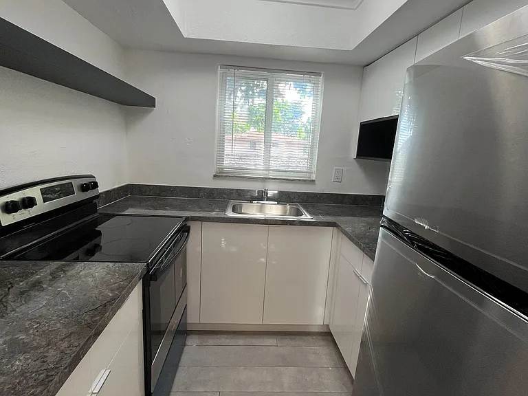 1949 NE 172nd St #10 — Photo 3