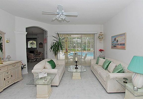 LIVING ROOM OVERLOOKING POOL