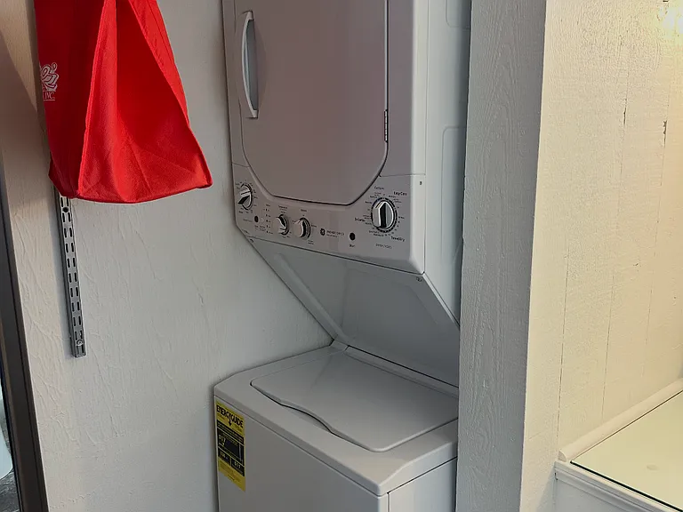 mirrored double wide closet with personal washer & dryer