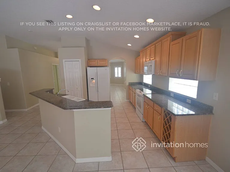 4704 Whispering Wind Ave — Photo 7