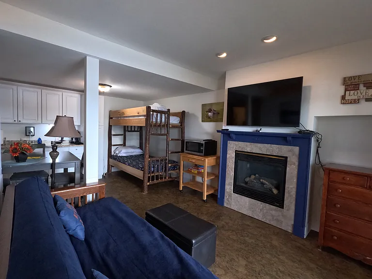 bunk bed area and fire place