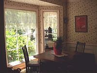 Bay windows in dining rm.