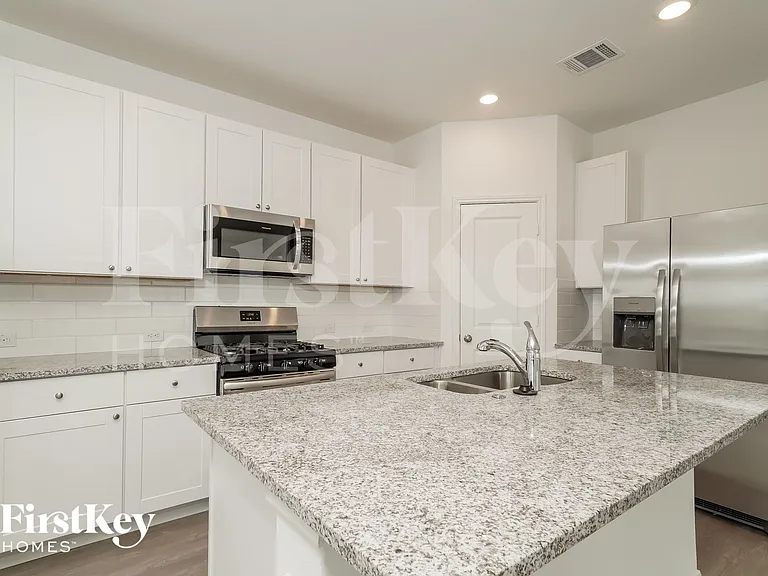 13003 Rosemary Cv — Photo 6