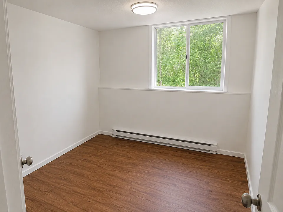 Smaller of the 2 bedrooms. Great as an office or guest room