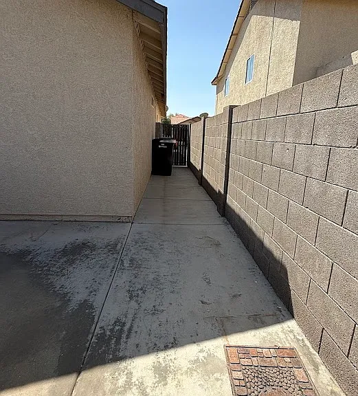 Side yard has been concreted to make area clean and easy for trashcans and cleanliness.