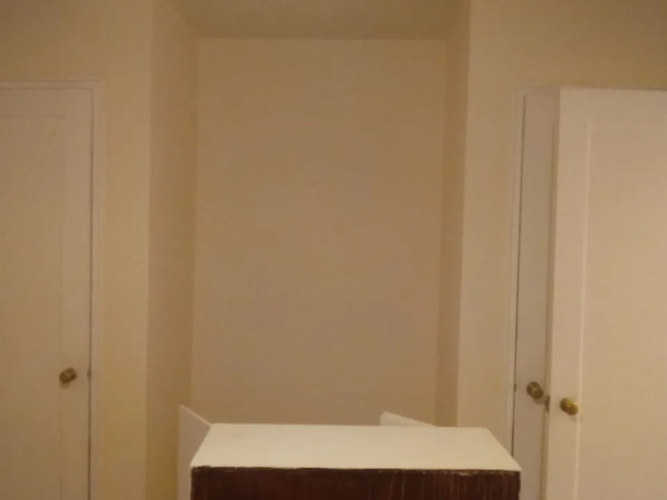 Two closets in bedroom and recessed area between them
