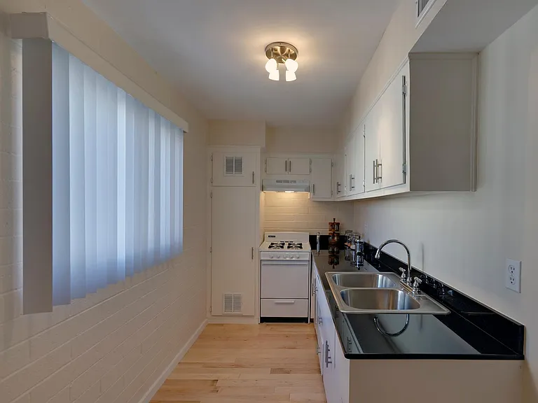 Granite, gas range, and dishwashers in every unit.