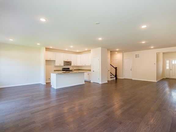 Open layout displaying the gathering and dining area