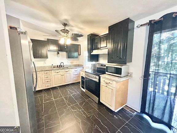5th image of 2877 SW Woodburn Ct