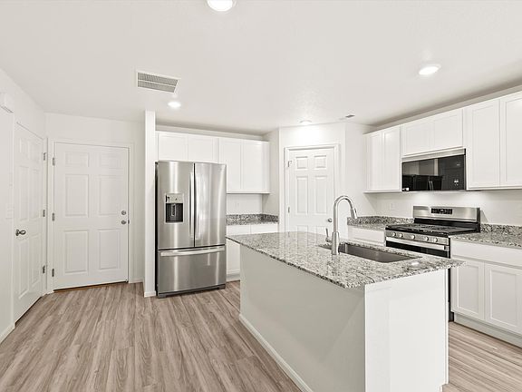 The Loveland floorplan image taken at a Meritage Homes community in Aurora, CO.