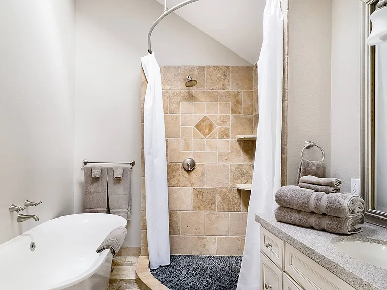 Large, open upstairs ensuiet shower with dual showerheads