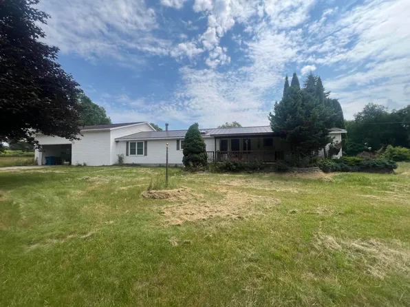 323 S Nellsville Rd, Houghton Lake, MI 48629