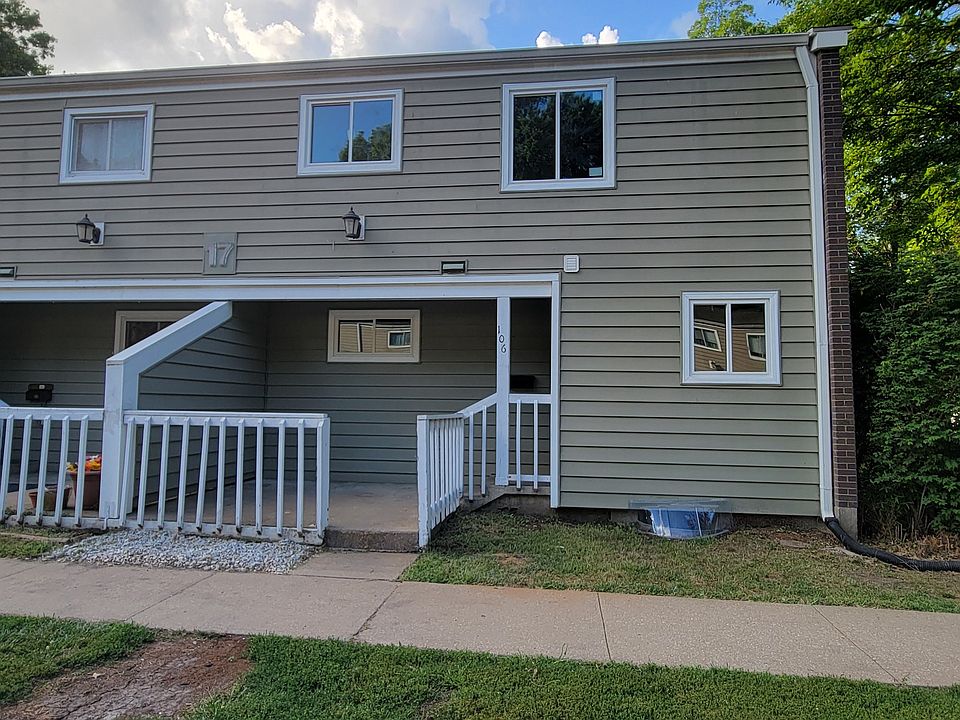 Front of the unit with a patio which is partially covered