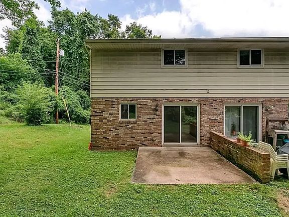 Pleasant rear patio. Great for a grill!