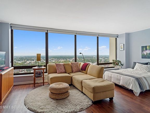 Unit unfurnished. Previous resident furniture, art shown.