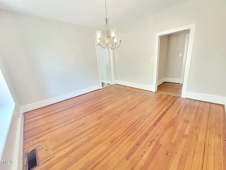 Formal dining room with pantry and bay windows