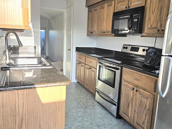 Kitchen entry from rear Patio Deck.