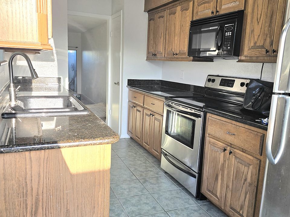 Kitchen entry from rear Patio Deck.