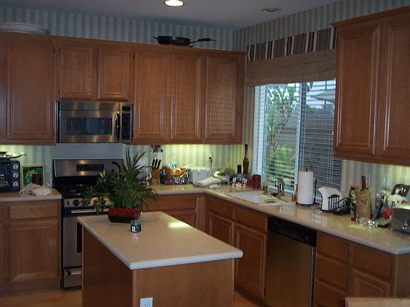 Kitchen with island makes cooking a breeze