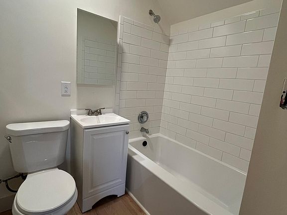 UPPER UNIT Full Bath **This listing is for the LOWER UNIT. Units are nearly identical. Lower Unit Photos coming soon.**