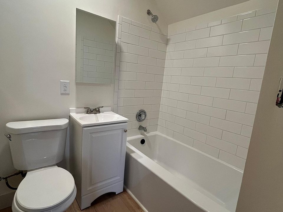 UPPER UNIT Full Bath **This listing is for the LOWER UNIT. Units are nearly identical. Lower Unit Photos coming soon.**