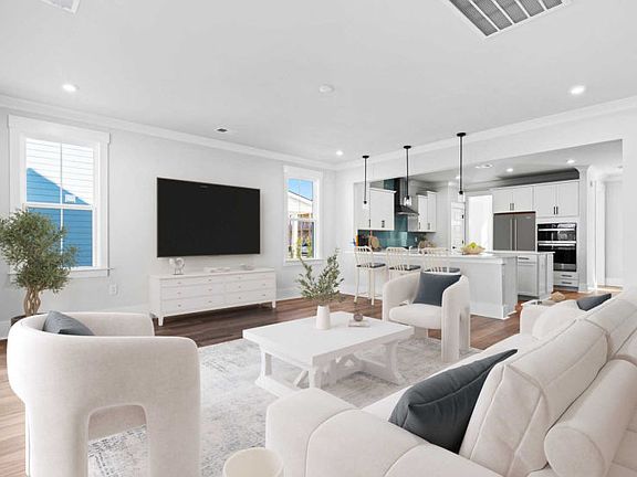 Spacious Living Room. Model Home Representation.