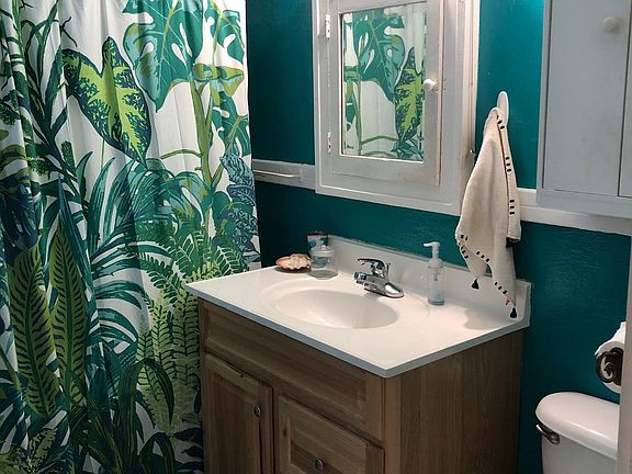 Bathroom - color is now beige. Will update photo when available.