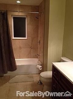 guest bath with custom shower surround