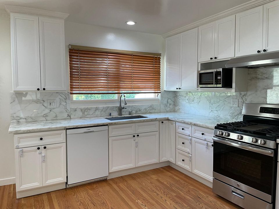 kitchen features beautiful marble tile