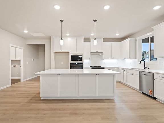 705 N Thrush CT by Aho Construction