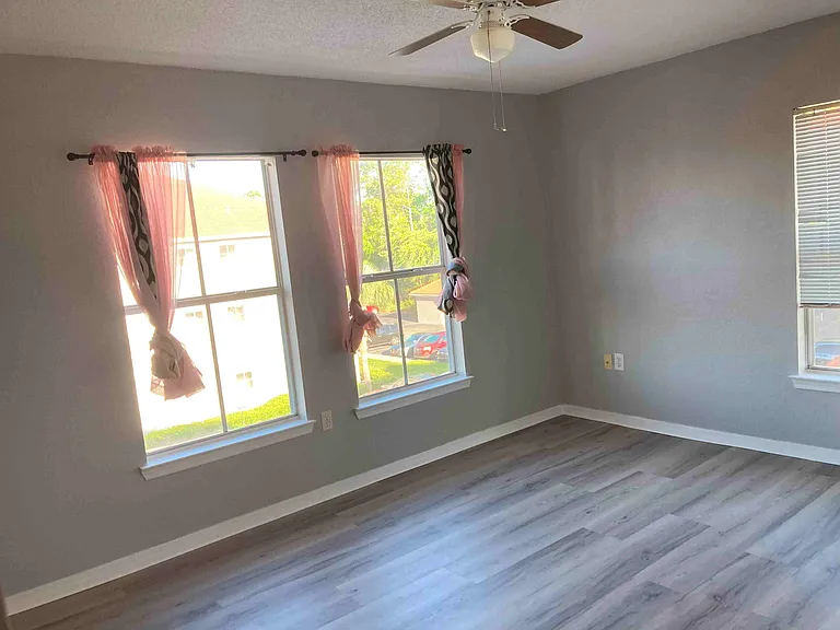 The 2nd bedroom with new installed Vinyl plank floor