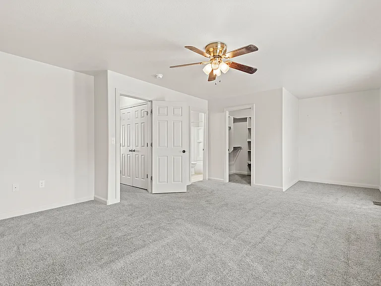 Large, spacious main bedroom suite, full bath, walk in closet, patio deck