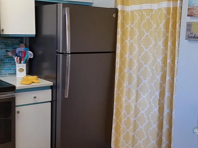 Stacked washer dryer in unit