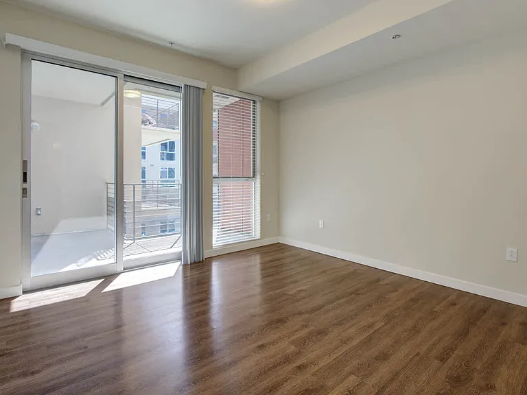 Bedroom with Balcony and Hard Surface Flooring