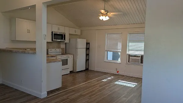 L Shaped kitchen includes all appliances.
