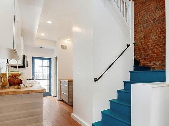 Open-concept kitchen, living, and dining