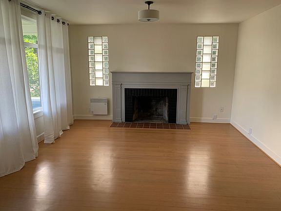 large living room with working fireplace
