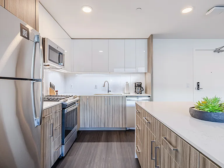 Sophisticated kitchen design featuring fine-grained walnut cabinets and premium fixtures