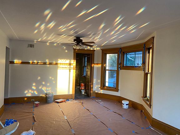 Sunset Rainbows from living room window. Door to kitchen swings both ways.