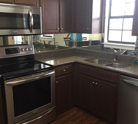 Fabulous granite and stainless steel appliances in open kitc