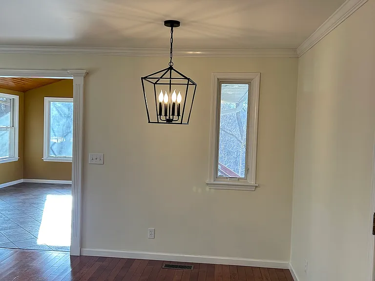 Dining area with new light fixture.