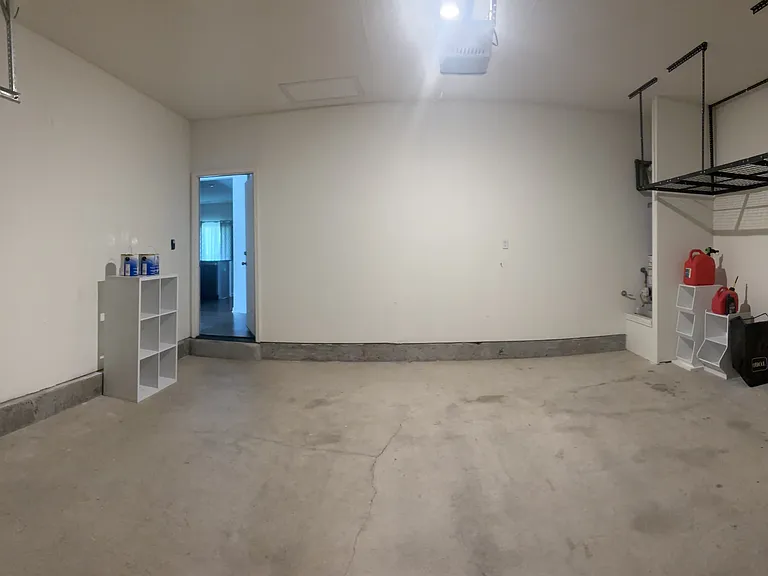 Garage has a hanging storage space