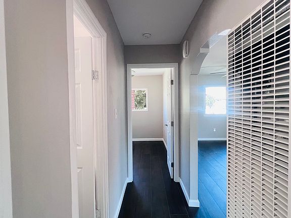 Hallway connecting bedrooms.
