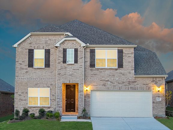 The Lexington, a two-story home with 2-car garage, shown as Home Exterior B