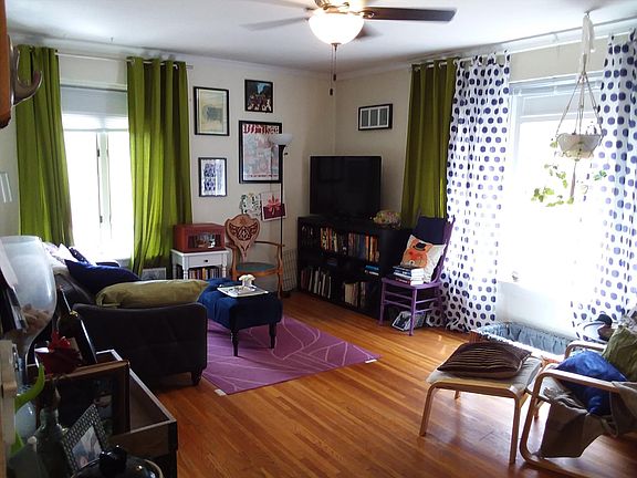 Light, bright & spacious living room with hardwood floors