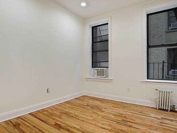 3rd image of 209 E 10th St APT 4A