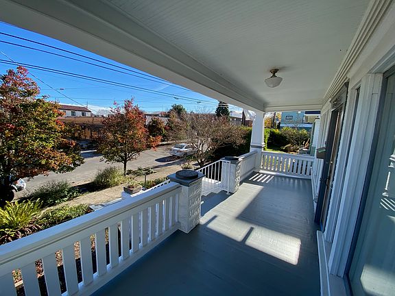 Front porch, looking SE toward the corner of 4th Ave. N. and Boston St.