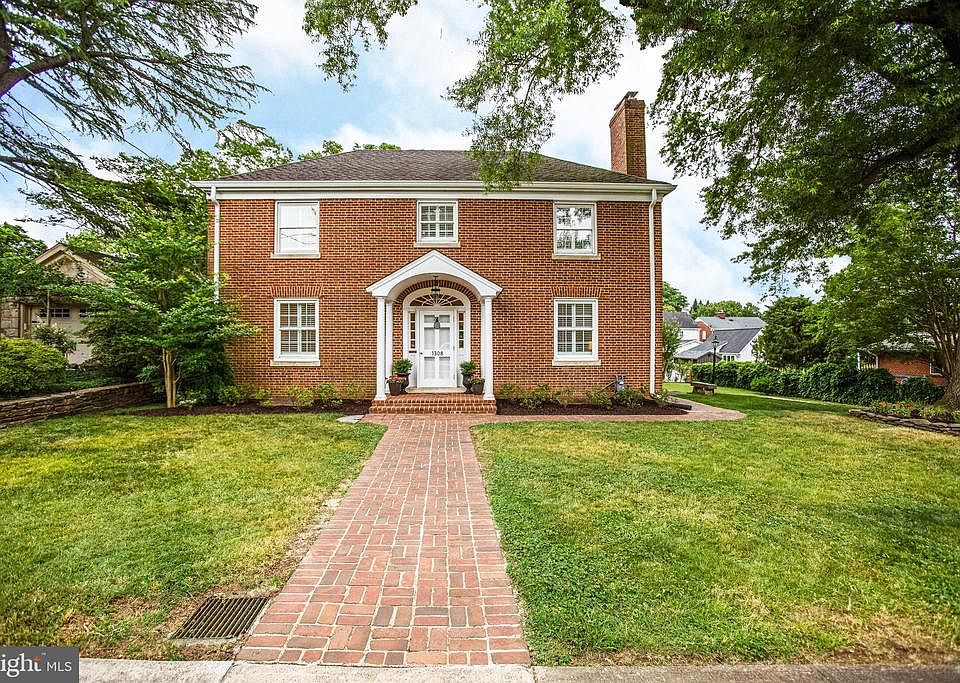 Beautiful Brick Colonial on a large double lot.